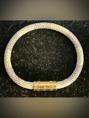 Louis Vuitton Keep It bracelet is designed with the label's Damier Azur canvas!
